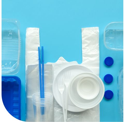 Plastic packaging items including bags, cups and containers on a blue background