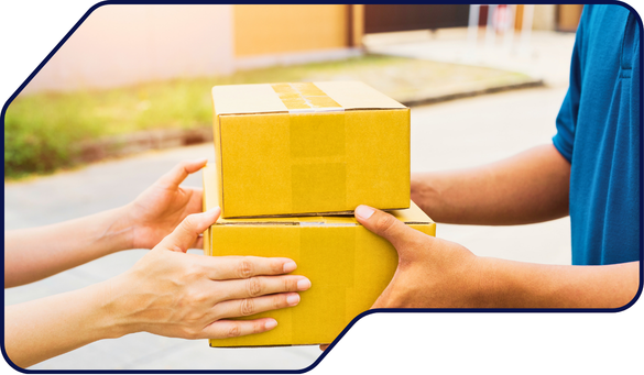 A delivery person handing over cardboard boxes, illustrating packaging waste responsibility